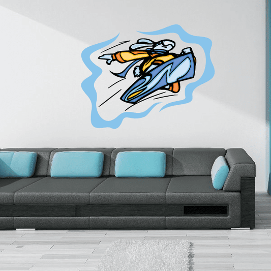 Die-cut vinyl wall decal of a snowboarder on white with blue and orange details