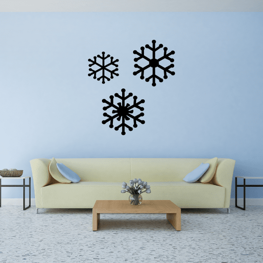 Snowflake trio wall decal with three black snowflake icons
