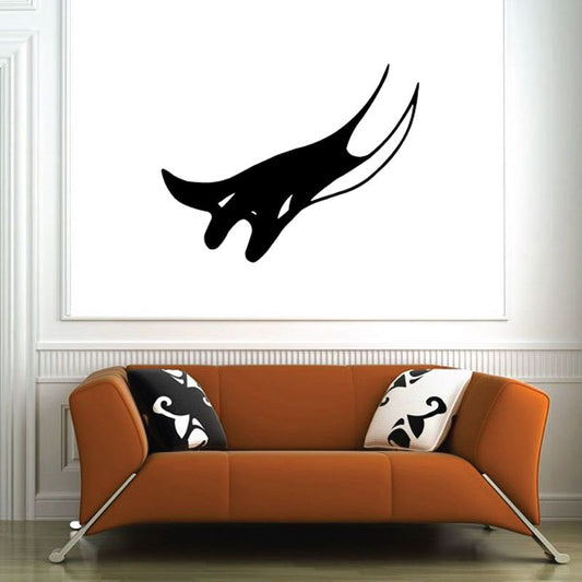 Black soaring stingray wall decal with stylized fins and upward arcing tail