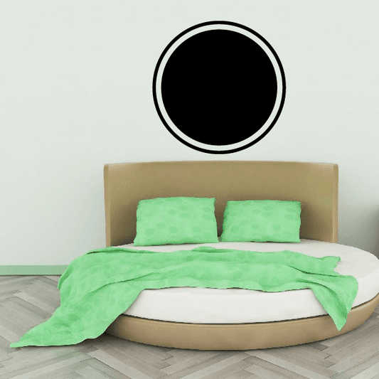 Black solid circle wall decal with thin double-ring border
