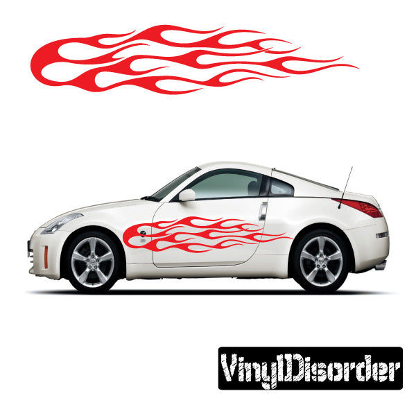 Red flame vinyl decal on a white car side panels, centered flame stripe design.