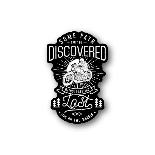 Motorcycle vinyl sticker, black badge with text 'DISCOVERED' and rider on motorcycle
