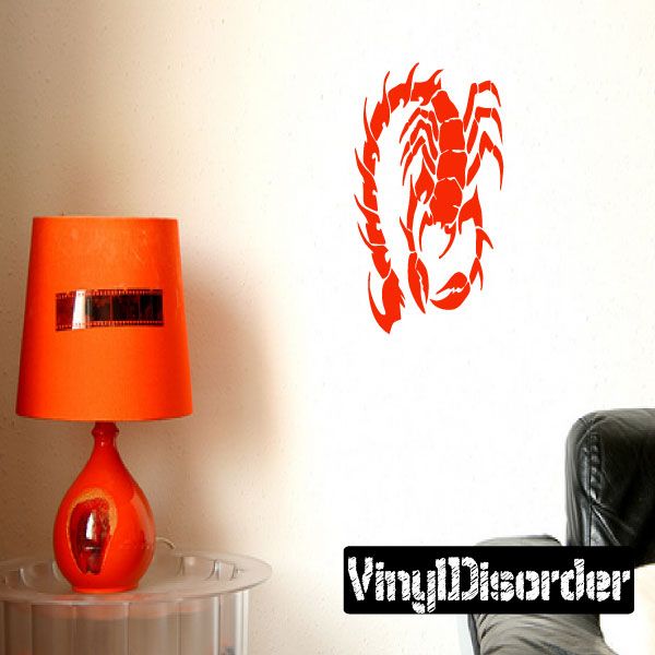 Red scorpion tail decal with spiky, flame-like outline