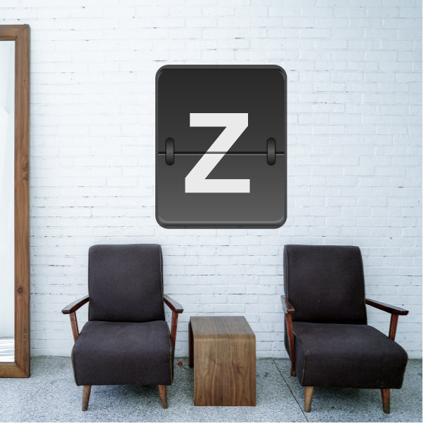 Split-flap monogram sticker, dark square with letter Z and flip-panel detail