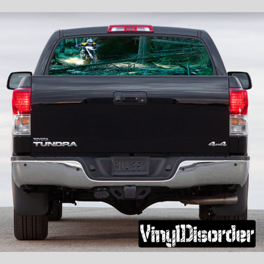 Rear window view through graphic decal for pickup truck