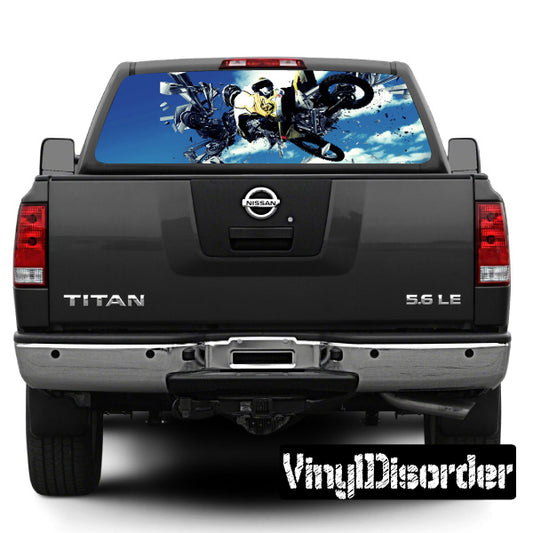 Dark pickup truck rear view with rear window graphic decal and tailgate