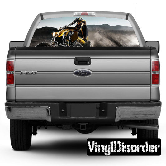 Pickup truck rear window graphic decal with motorcycle scene and dust trail