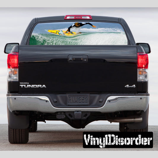 Surfing rear window graphic decal on pickup truck
