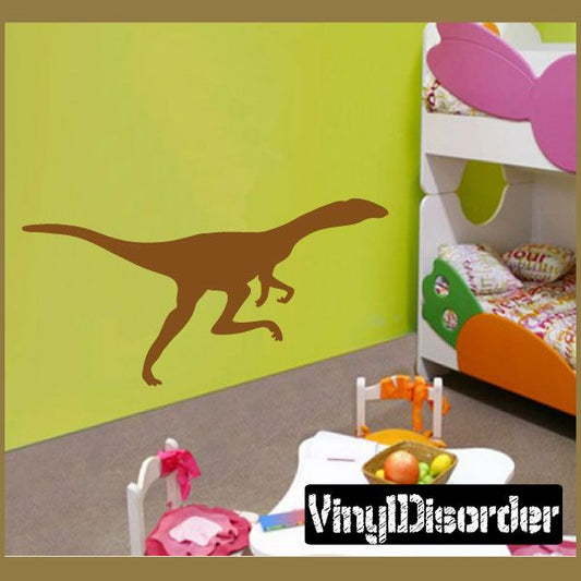 Sprinting velociraptor wall decal, brown dinosaur silhouette
