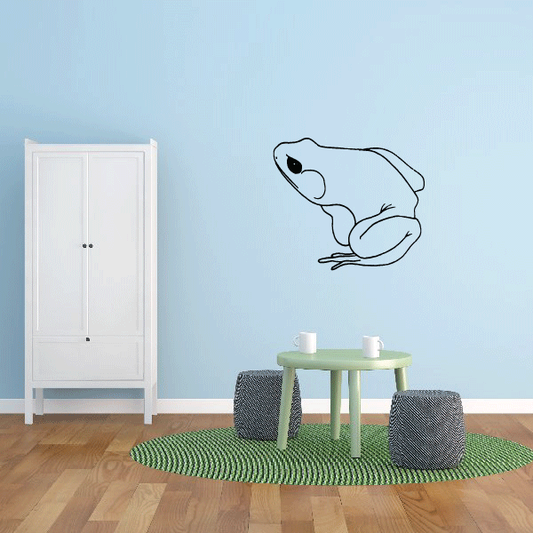 Squatting frog wall decal with black outline and pale blue fill
