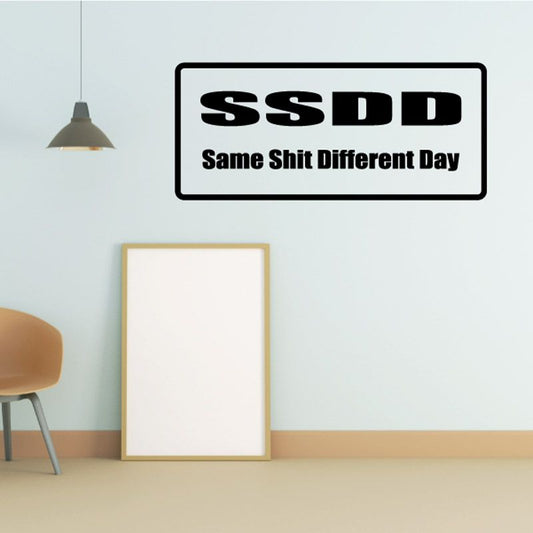 Wall decal: black SSDD logo and 'Same Shit Different Day' text on white