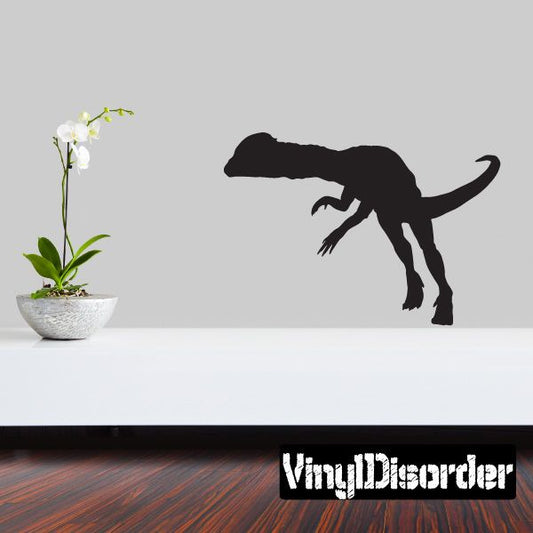 Stalking Dilophosaurus wall decal, black dinosaur silhouette with frill