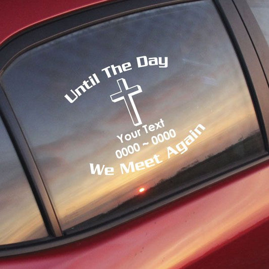 Car window memorial decal with white cross and "Until The Day" text