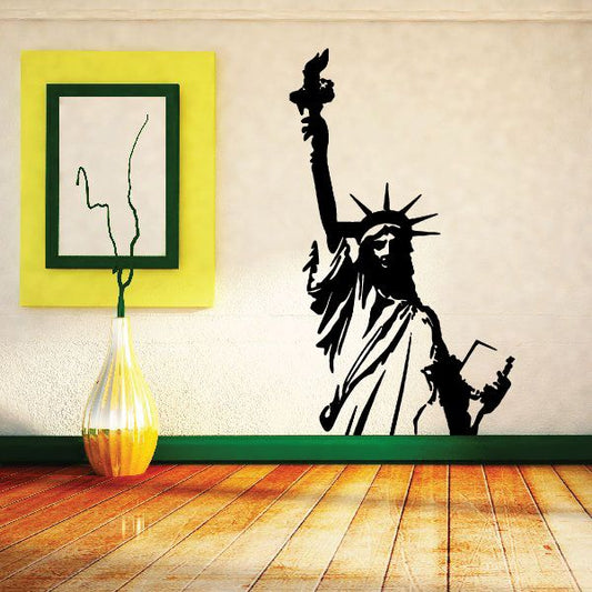 Statue of Liberty half decal, black silhouette with raised torch and crown