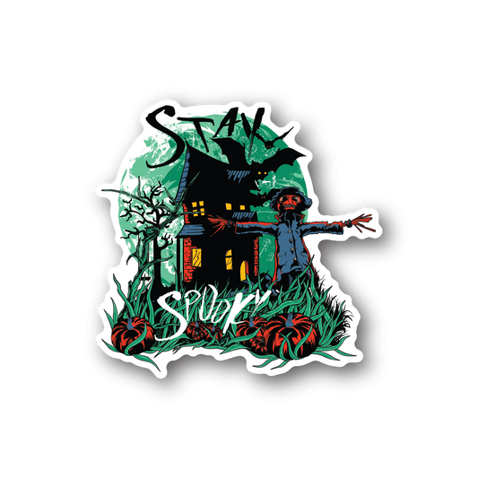 Haunted house vinyl sticker with spooky green-lit home and graveyard plants