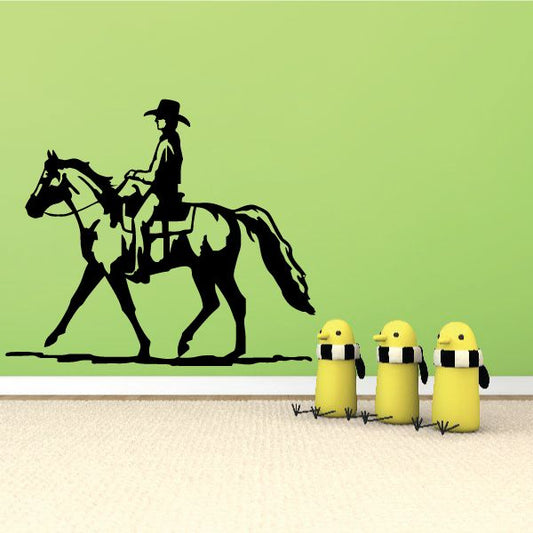 Cowboy riding horse decal silhouette, black