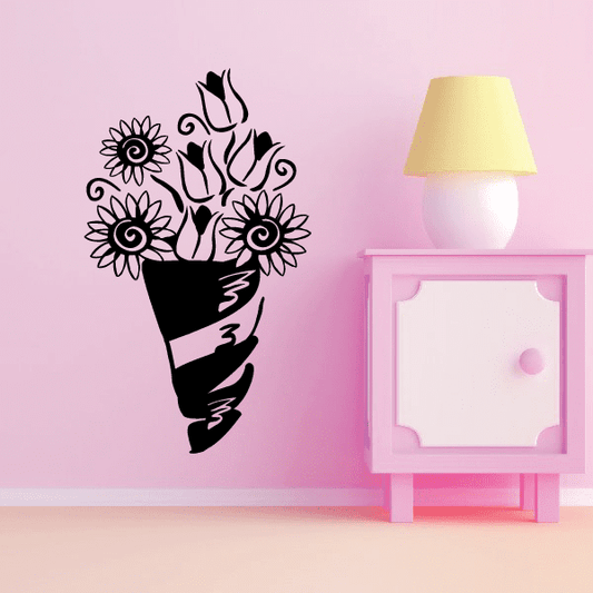 Flower bouquet decal with three daisy-style blooms and swirling leaves, black