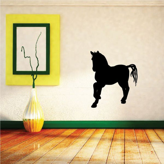 Black pony silhouette wall decal with raised tail and detailed mane