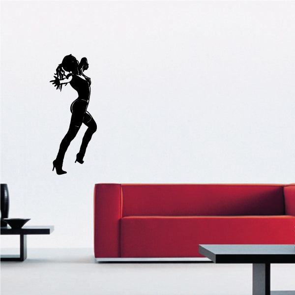 Black wall decal of a dancing dancer in heels, arms up silhouette