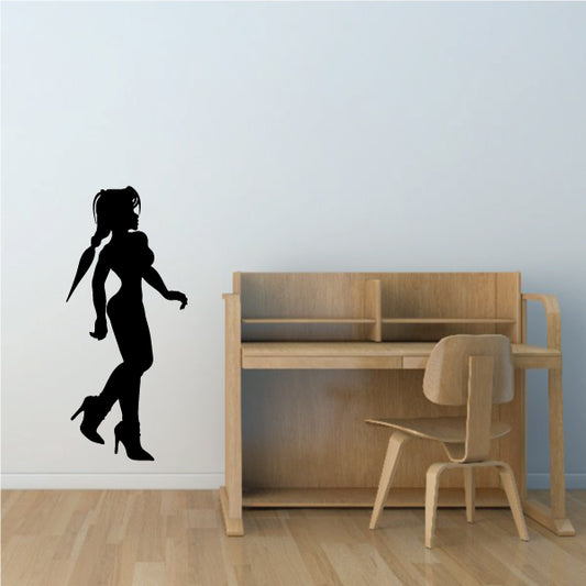 Dancer silhouette wall decal showing a walking pose in black.