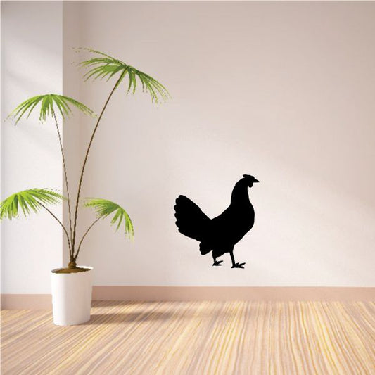 Walking hen silhouette wall decal with raised wing and tail
