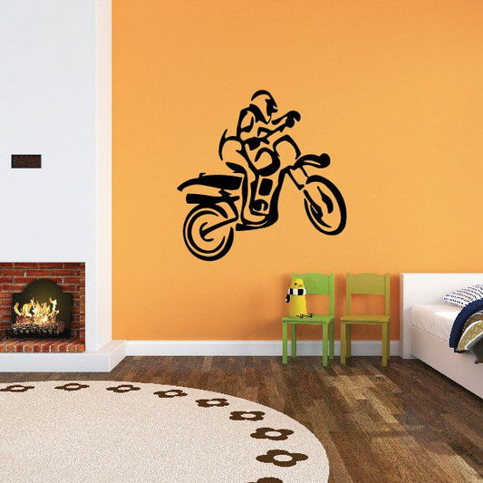 Dirt bike rider wall decal with black graphic silhouette on light wall