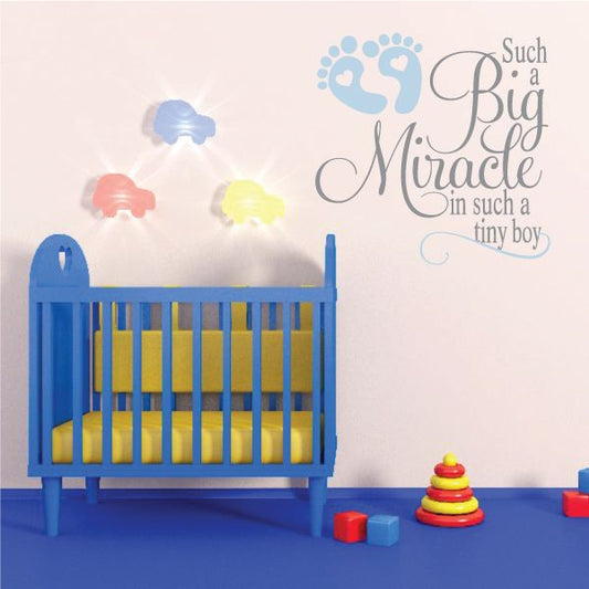 Baby wall decal with footprints, colorful baby silhouette, and quote text