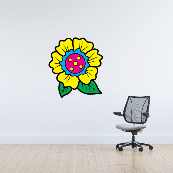 Flower sticker with yellow petals, pink center, and green leaves