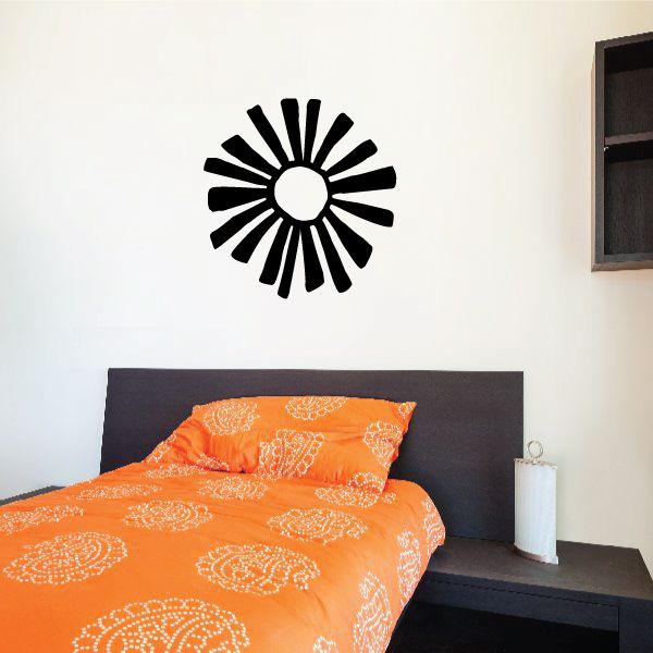 Black sunflower wall decal with bold petals and center circle