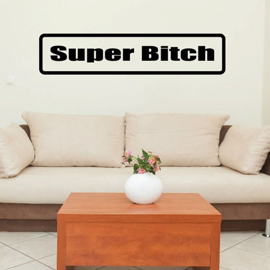 Black rectangular wall decal with bold "Super Bitch" lettering