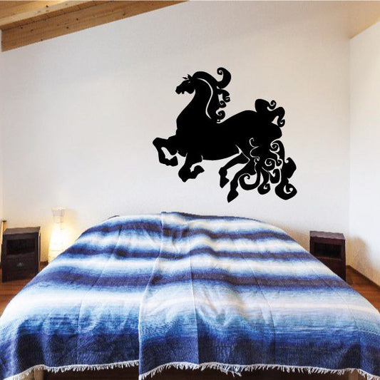 Black horse wall decal with curly mane and flowing tail silhouette