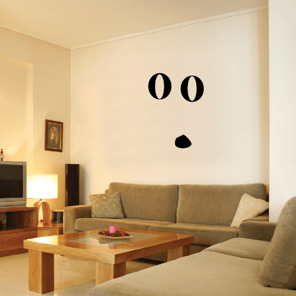 Surprised face pumpkin wall decal with black eyes and nose