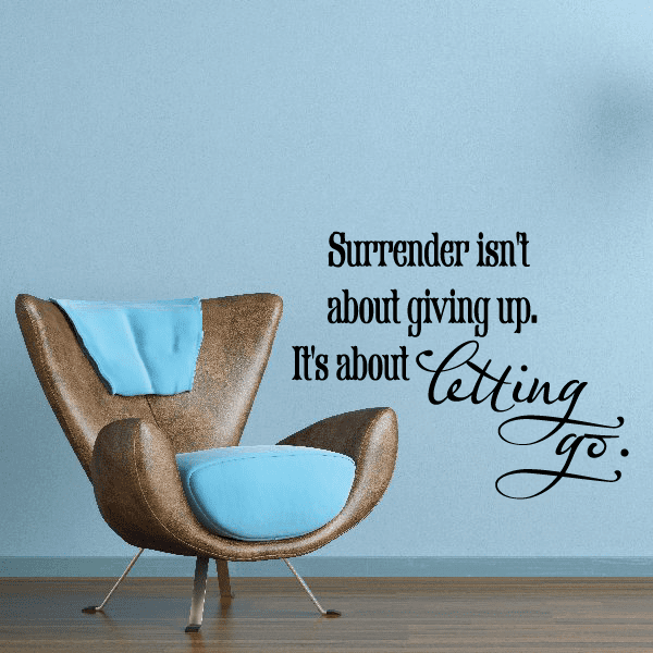 Motivational wall decal with quote: 'Surrender isn't about giving up; letting go'