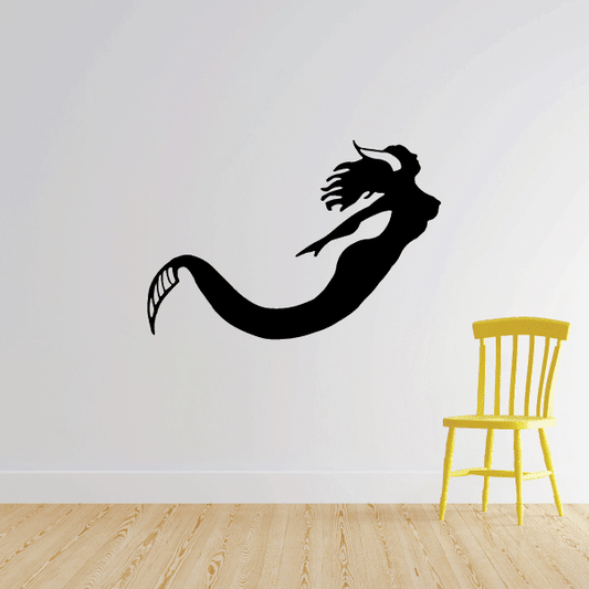 Swimming mermaid silhouette wall decal with flowing hair and curved tail