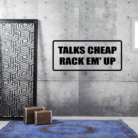 Wall decal: bold black 'TALKS CHEAP' and 'RACK EM' UP' text in rounded rectangle