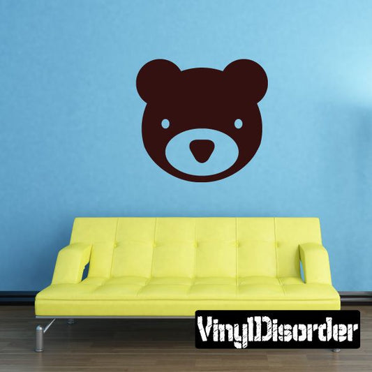 Teddy bear wall decal with dark brown bear face and light blue eyes