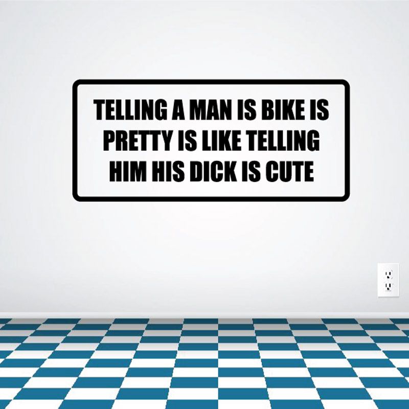 Rectangular quote decal with bold black text: Telling a man is bike is pretty.