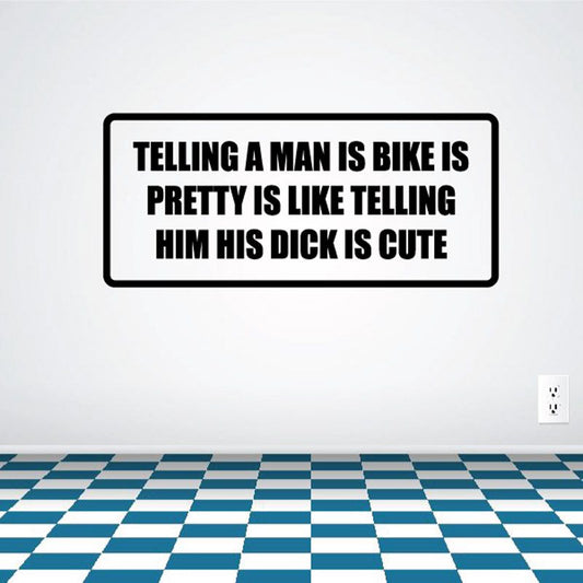 Rectangular quote decal with bold black text: Telling a man is bike is pretty.