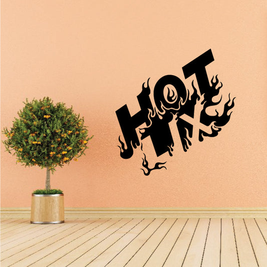 Flame text decal: black letters with orange fire accents