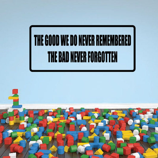 Rectangular wall decal, bold black slogan: 'GOOD WE DO NEVER REMEMBERED'