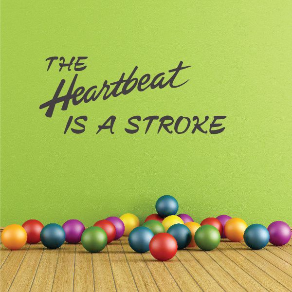 Heartbeat is a stroke wall decal in black script lettering