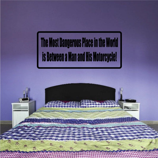 Rectangular wall decal with black border and quote: “The Most Dangerous Place in the World…”