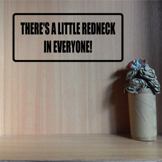 Rectangular decal with black border and quote text: “THERE'S A LITTLE REDNECK IN EVERYONE!”