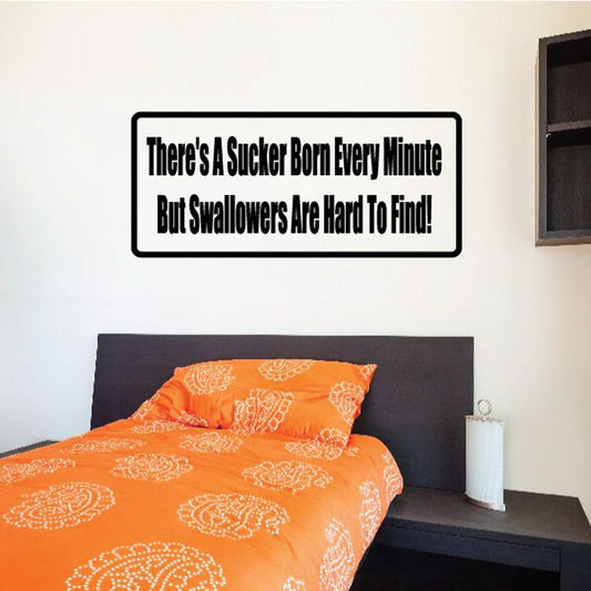 Wall decal with black border and bold text: “There’s a sucker born every minute”.
