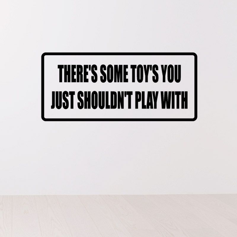 Rectangular wall decal with bold quote: 'There's some toys you just shouldn't play with'