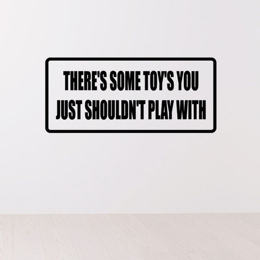 Rectangular wall decal with bold quote: 'There's some toys you just shouldn't play with'