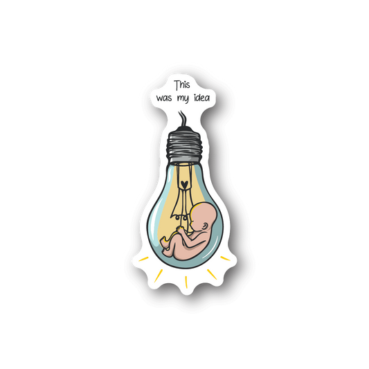 Baby vinyl sticker showing infant in bottle with bubble text "This was my idea".
