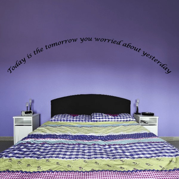 Wall decal with cursive quote: 'Today is the tomorrow you worried about yesterday'