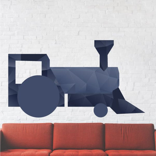 Origami-style train sticker, dark navy geometric shape with large round wheels