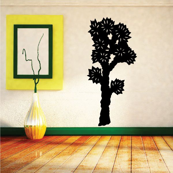 Black tree wall decal with leafy branches and trunk silhouette
